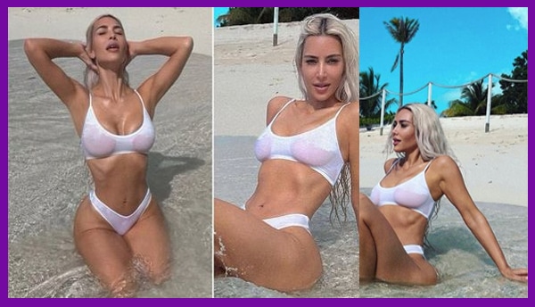 Kim Kardashian poses in a transparent white bikini