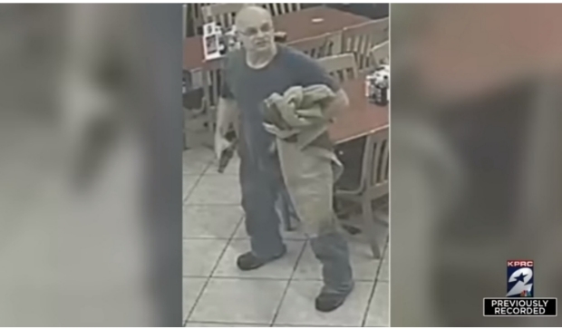 Houston police look for a customer who shot and killed robber at a restaurant